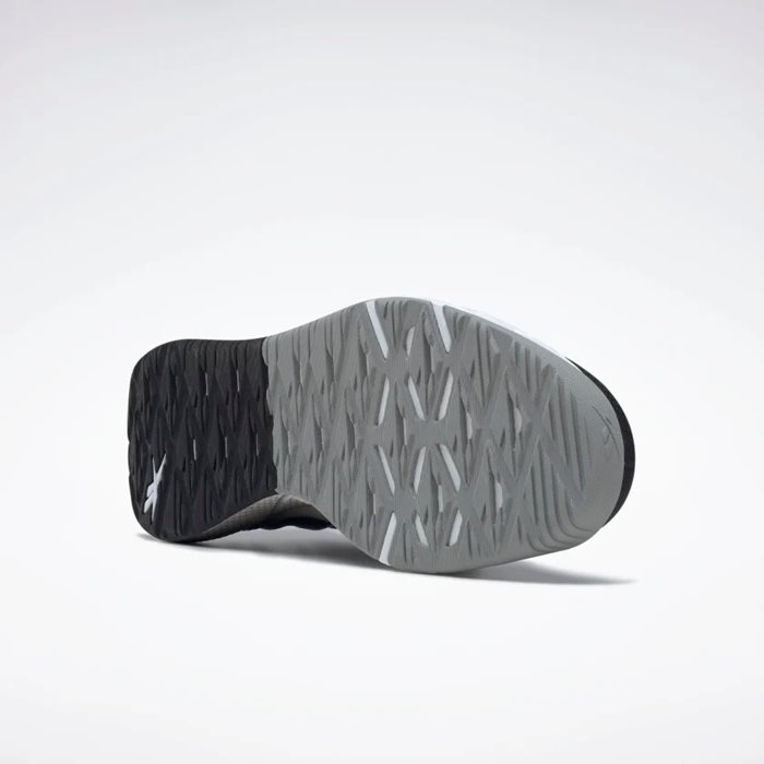 נעלי ריצה לבוגרים בצבע שחור/לבן דגם Nanoflex TR מבית REEBOK