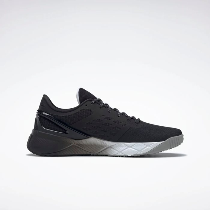 נעלי ריצה לבוגרים בצבע שחור/לבן דגם Nanoflex TR מבית REEBOK
