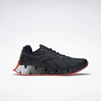 נעלי ריצה לבוגרים בצבע שחור/לבן דגם ZIG DYNAMICA מבית REEBOK