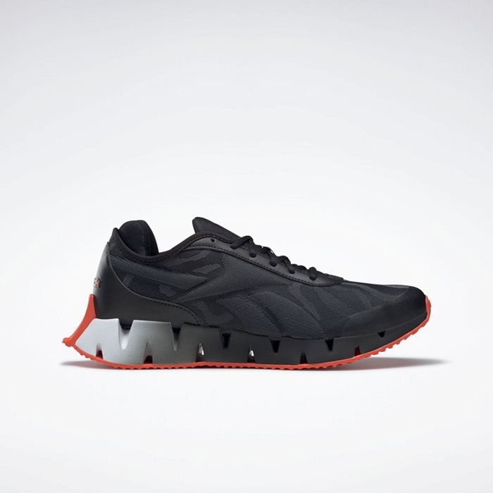 נעלי ריצה לבוגרים בצבע שחור/לבן דגם ZIG DYNAMICA מבית REEBOK