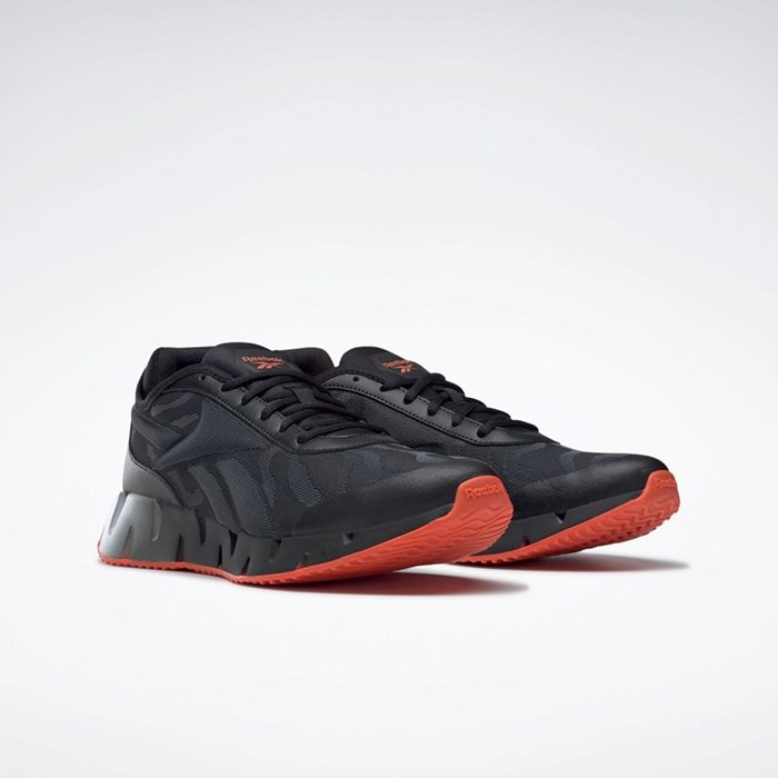 נעלי ריצה לבוגרים בצבע שחור/לבן דגם ZIG DYNAMICA מבית REEBOK