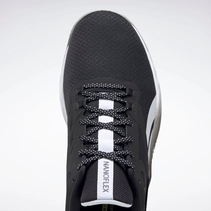 נעלי ריצה לבוגרים בצבע שחור/לבן דגם Nanoflex TR מבית REEBOK